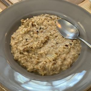 Arroz meloso con puerro, coco y nueces  at Caesura Gastro-sala in Badajoz