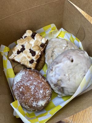 S'mores bar, apple fritter, jelly doughnut, pb cookie and blueberry scone  at Yellow Rose Vegan Bakery in Maplewood