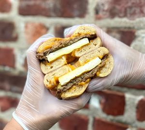 Our most popular breakfast sandwich—a vegan sausage egg and cheese on a housemade bagel! Available every day!  at Yellow Rose Vegan Bakery in Maplewood