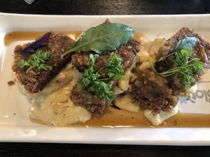 Sausage and biscuits with gravy. at The Plot in Oceanside