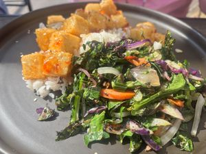 Crispy spicy tofu, rice, & fresh green & veggie medley.  at The Plot in Oceanside
