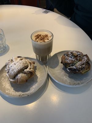 Cinnamon and pistachio roll with a chai latte with vegan caramel- a must!   at FACTORY GIRL Restaurant. in Amsterdam