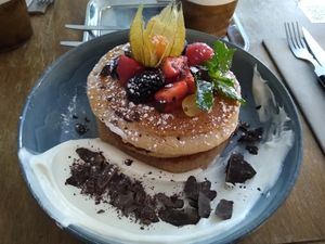 Vegan banana and tahini pancakes at FACTORY GIRL Restaurant. in Amsterdam