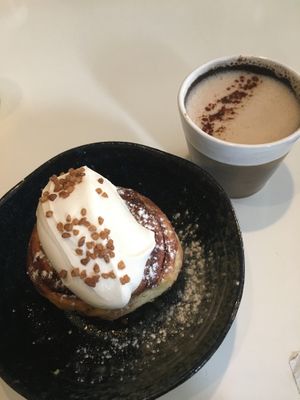 Cinnamon bun napoleon & chai latte with oat milk  at FACTORY GIRL Restaurant. in Amsterdam