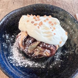 Vegan cinnamon bun  at FACTORY GIRL Restaurant. in Amsterdam