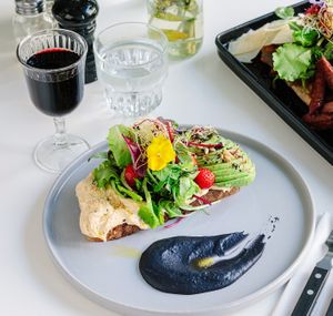 Vegan LA DE DAH
homemade hummus, avocado, mashed beetroot on bio dark sourdough bread  at FACTORY GIRL Restaurant. in Amsterdam