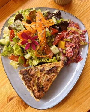 Vegan quiche with colourful salad at BioWelten BistroCafé & Organic Supermarket in Immenstadt