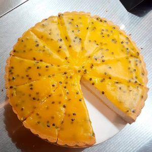 Yummy homemade vegan mango maracuja cheesecake at BioWelten BistroCafé & Organic Supermarket in Immenstadt