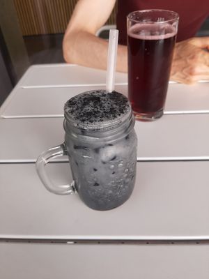 cold coconut latte with coal at Vierzehn in Loerrach