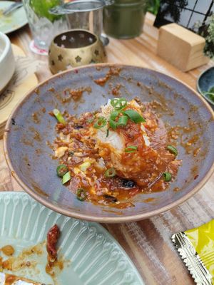 Unfortunately the picture i made before i started to eat failed. But here you can see there was a lot of it, and a bit of whats in it. Silken tofu was in the sauce. Mapo tofu at Het Paradijs in Enschede