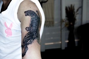 𝙄𝙂: 𝙣𝙖𝙩𝙚_𝙩𝙝𝙖𝙞𝙡𝙖𝙣𝙙 🌿 Ethereal blackwork tiger on the arm - Baan Khagee Tattoo Chiang Mai, Thailand at Baan Khagee Tattoo in Chiang Mai