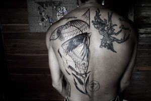 𝙄𝙂: 𝙣𝙖𝙩𝙚_𝙩𝙝𝙖𝙞𝙡𝙖𝙣𝙙 🌿 Blackwork birds tattoo and tribal fine line pattern on Walter's back at Baan Khagee by Nate, a tattoo artist in Chiang Mai, Thailand at Baan Khagee Tattoo in Chiang Mai