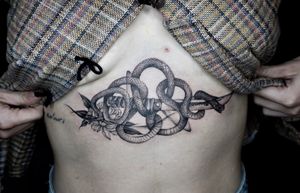 𝙄𝙂: 𝙣𝙖𝙩𝙚_𝙩𝙝𝙖𝙞𝙡𝙖𝙣𝙙 🌿 blackwork snake tattoo with Japanese sword by tattoo artist in Chiang Mai, , Thailand, Nate at Baan Khagee Tattoo in Chiang Mai