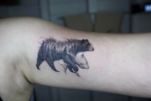 𝙄𝙂: 𝙣𝙖𝙩𝙚_𝙩𝙝𝙖𝙞𝙡𝙖𝙣𝙙 🌿 Blackwork abstract bear tattoo with pine tree forest by a tattoo artist on the mountains in Chiang Mai, Thailand  at Baan Khagee Tattoo in Chiang Mai