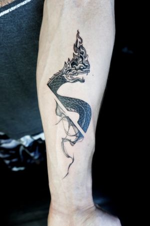 𝙄𝙂: 𝙣𝙖𝙩𝙚_𝙩𝙝𝙖𝙞𝙡𝙖𝙣𝙙 🌿 Blackwork Thai Naga tattoo by Baan Khagee Tattoo Chiang Mai, Thailand at Baan Khagee Tattoo in Chiang Mai