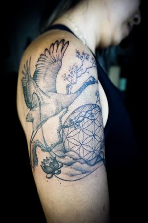 𝙄𝙂: 𝙣𝙖𝙩𝙚_𝙩𝙝𝙖𝙞𝙡𝙖𝙣𝙙 🌿 Realistic blackwork crane bird tattoo with Sakura flowers and lotus by Baan Khagee Tattoo Chiang Mai, Thailand at Baan Khagee Tattoo in Chiang Mai