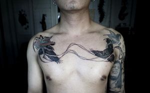 𝙄𝙂: 𝙣𝙖𝙩𝙚_𝙩𝙝𝙖𝙞𝙡𝙖𝙣𝙙 🌿 Blackwork raven bird tattoo with abstract fine linework by Baan Khagee Tattoo Chiang Mai, Thailand at Baan Khagee Tattoo in Chiang Mai