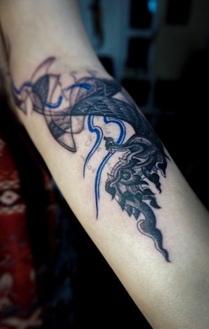 𝙄𝙂: 𝙣𝙖𝙩𝙚_𝙩𝙝𝙖𝙞𝙡𝙖𝙣𝙙 🌿 Blackwork Thai Naga tattoo with abstract art on forearm by Baan Khagee Tattoo Chiang Mai, Thailand at Baan Khagee Tattoo in Chiang Mai