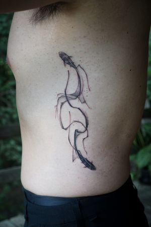 𝙄𝙂: 𝙣𝙖𝙩𝙚_𝙩𝙝𝙖𝙞𝙡𝙖𝙣𝙙 🌿 Abstract Yin&Yang Koi fish tattoo by Baan Khagee Tattoo Chiang Mai, Thailand at Baan Khagee Tattoo in Chiang Mai
