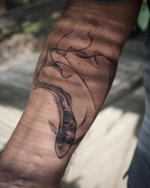 𝙄𝙂: 𝙣𝙖𝙩𝙚_𝙩𝙝𝙖𝙞𝙡𝙖𝙣𝙙 🌿 Flowing Koi fish tattoo by Thai tattoo artist in Chiang Mai, Thailand at Baan Khagee Tattoo in Chiang Mai