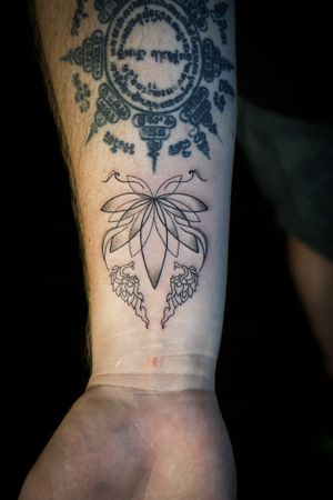 𝙄𝙂: 𝙣𝙖𝙩𝙚_𝙩𝙝𝙖𝙞𝙡𝙖𝙣𝙙 🍃 Fine line Thai lotus tattoo with Thai Naga by Baan Khagee Tattoo Chiang Mai, Thailand  at Baan Khagee Tattoo in Chiang Mai
