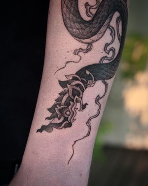 𝙄𝙂: 𝙣𝙖𝙩𝙚_𝙩𝙝𝙖𝙞𝙡𝙖𝙣𝙙 🍃 Blackwork Thai Naga tattoo by A Thai tattoo artist in Chiang Mai, Thailand at Baan Khagee Tattoo in Chiang Mai