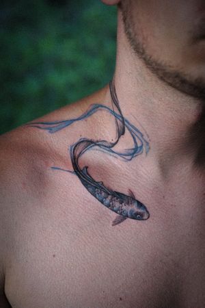 𝙄𝙂: 𝙣𝙖𝙩𝙚_𝙩𝙝𝙖𝙞𝙡𝙖𝙣𝙙 🍃 Koi fish tattoo with abstract flow by Baan Khagee Tattoo Chiang Mai, Thailand at Baan Khagee Tattoo in Chiang Mai