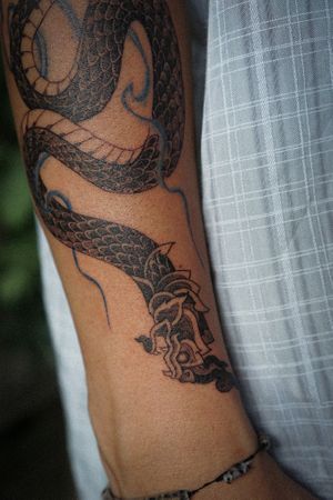 𝙄𝙂: 𝙣𝙖𝙩𝙚_𝙩𝙝𝙖𝙞𝙡𝙖𝙣𝙙 🍃 Blackwork Thai Naga tattoo by Baan Khagee Tattoo Chiang Mai, Thailand at Baan Khagee Tattoo in Chiang Mai