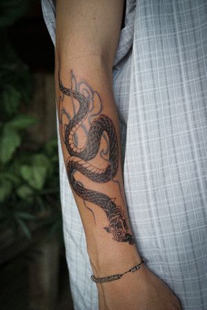 𝙄𝙂: 𝙣𝙖𝙩𝙚_𝙩𝙝𝙖𝙞𝙡𝙖𝙣𝙙 🍃 Blackwork Thai Naga tattoo with flow by a Thai tattoo artist in Chiang Mai, thailand at Baan Khagee Tattoo in Chiang Mai