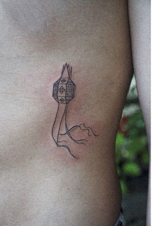 𝙄𝙂: 𝙣𝙖𝙩𝙚_𝙩𝙝𝙖𝙞𝙡𝙖𝙣𝙙 🍃 Fine line Thai Lanna lantern tattoo by Baan Khagee Tattoo Chiang Mai, Thailand at Baan Khagee Tattoo in Chiang Mai