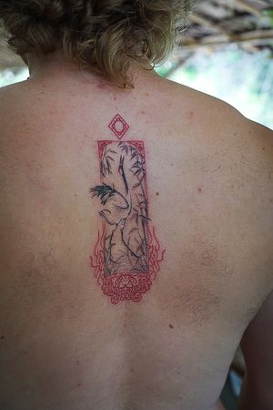 𝙄𝙂: 𝙣𝙖𝙩𝙚_𝙩𝙝𝙖𝙞𝙡𝙖𝙣𝙙 🍃 Japanese crane painting tattoo with decorative Foo dog frame by a Thai tattoo artist in Chiang Mai, Thailand at Baan Khagee Tattoo in Chiang Mai