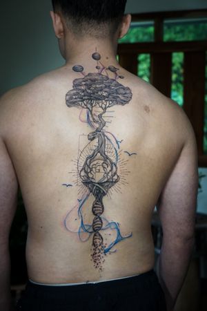 𝙄𝙂: 𝙣𝙖𝙩𝙚_𝙩𝙝𝙖𝙞𝙡𝙖𝙣𝙙 🍃 Full back fine line tree and DNA tattoo with flowing koi fish by a Thai tattooist in Chiang Mai, Thailand at Baan Khagee Tattoo in Chiang Mai