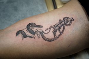 𝙄𝙂: 𝙣𝙖𝙩𝙚_𝙩𝙝𝙖𝙞𝙡𝙖𝙣𝙙 🍃 Fine line the creation of Adam tattoo with snake wrapping around by Baan Khagee Tattoo Chiang Mai, Thailand  at Baan Khagee Tattoo in Chiang Mai
