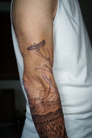 𝙄𝙂: 𝙣𝙖𝙩𝙚_𝙩𝙝𝙖𝙞𝙡𝙖𝙣𝙙 🍃 Flowing eagle tattoo on the arm by a Thai tattooist in Chiang Mai, Thailand at Baan Khagee Tattoo in Chiang Mai