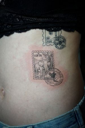 𝙄𝙂: 𝙣𝙖𝙩𝙚_𝙩𝙝𝙖𝙞𝙡𝙖𝙣𝙙 🍃 Fine line Thai elephant stamp tattoo by Baan Khagee Tattoo Chiang Mai, Thailand at Baan Khagee Tattoo in Chiang Mai