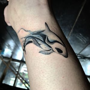 𝙄𝙂: 𝙣𝙖𝙩𝙚_𝙩𝙝𝙖𝙞𝙡𝙖𝙣𝙙 🌿 Ethereal white orca tattoo with water wisp at Baan Khagee Tattoo Chiang Mai, Thailand at Baan Khagee Tattoo in Chiang Mai