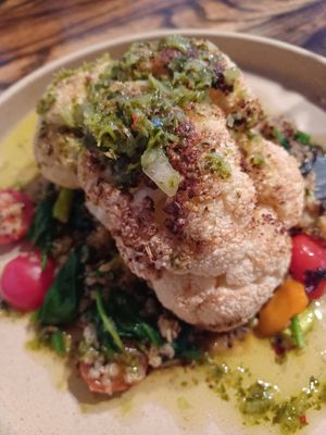 Cauliflower Steak with Chimchuri, Quinoa and Vegetables at Spritz City Bistro in Stuart