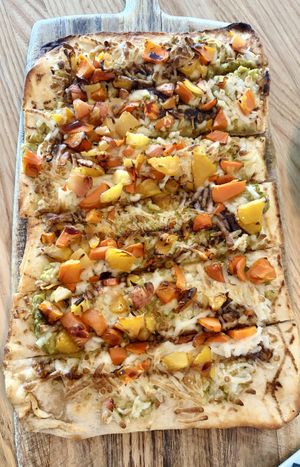 Flatbread w/hummus and vegan cheesee  at Spritz City Bistro in Stuart