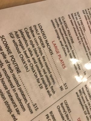 The loaded nachos are huge- we had half the portion and could hardly finish :) at Dead Bird Brewing in Milwaukee