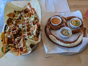 Loaded nachos + giant pretzel w/ beer cheeze dip at Dead Bird Brewing in Milwaukee