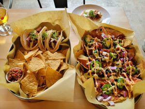 Street tacos with chips and salsa, 1/2 order of loaded nachos, and one Blanco taco at Dead Bird Brewing in Milwaukee