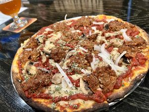 SHMO (house made mozzarella, red sauce and Italian sausage) with mushroom and onions  at Dead Bird Brewing in Milwaukee