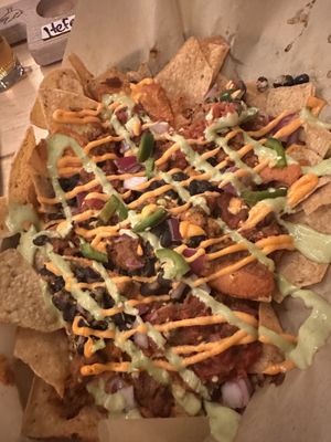 The half load of vegan nachos with chik‘un my favorite   at Dead Bird Brewing in Milwaukee