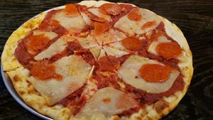 Pepperoni pizza. Homemade vegan cheese. $15. at Dead Bird Brewing in Milwaukee