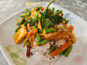 sorry, forgot the exact name. I believe it was the stir fried veggies in roasted curry paste on rice. at Vegetarian Eatery อารหารเจ ร้านสำหรับเจ in Ayutthaya