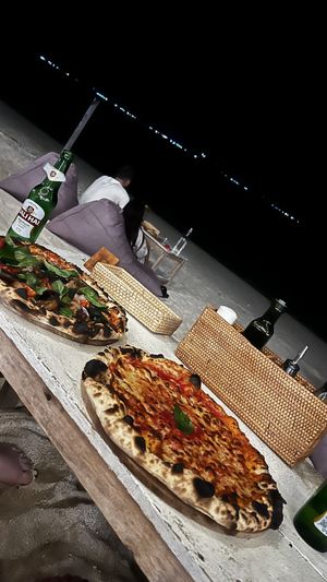 Vegan pizza on the left !!   at Mama Pizza in 