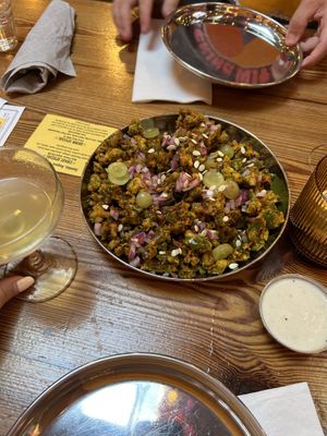 Kale Pakoras Chaat made vegan without the yogurt. So yummy!   at Chai Pani in Asheville