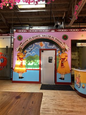 Lots of artwork   at Chai Pani in Asheville