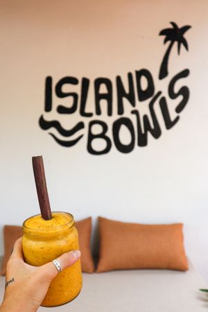 Hikkaduwa Tango smoothie with papaya stem straw at Island Bowls in Hikkaduwa