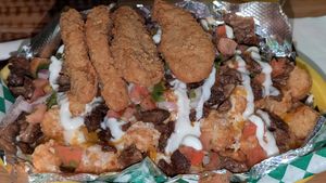 Loaded tots with vegan carne asada. at Handle Bar in Salt Lake City